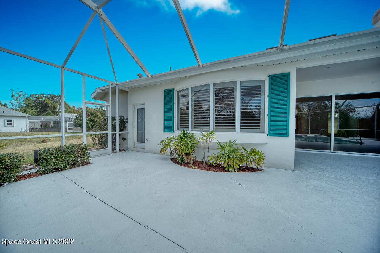 4099 Sparrow Hawk Road Melbourne, FL 32934 - Photo 42 of 48 a house view with a garden space
