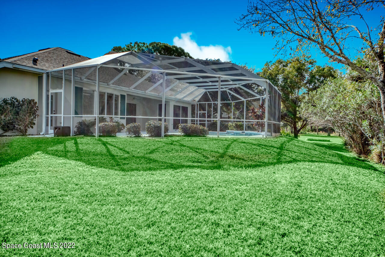4099 Sparrow Hawk Road Melbourne, FL 32934 - Photo 45 of 48 a view of a house with a yard
