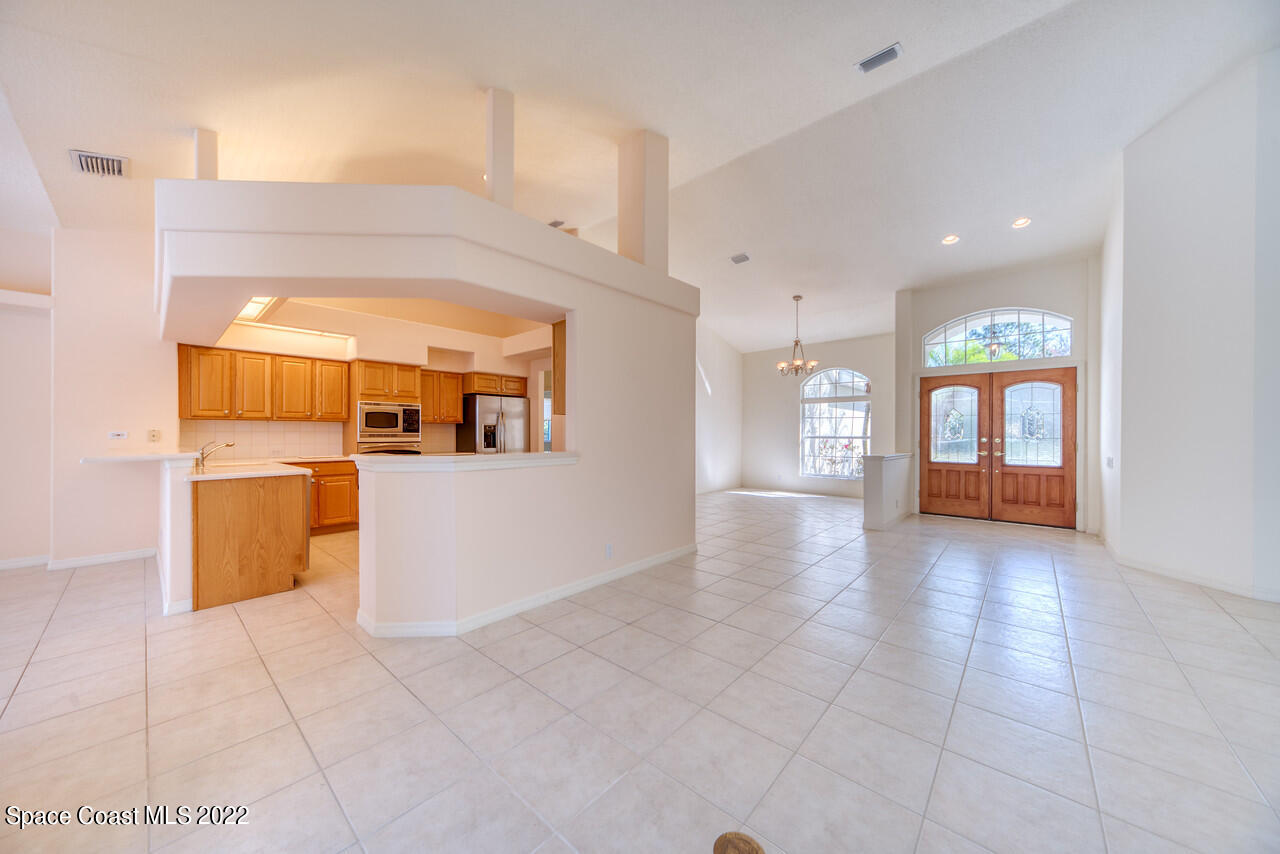 4099 Sparrow Hawk Road Melbourne, FL 32934 - Photo 6 of 48 a view of a kitchen with a sink