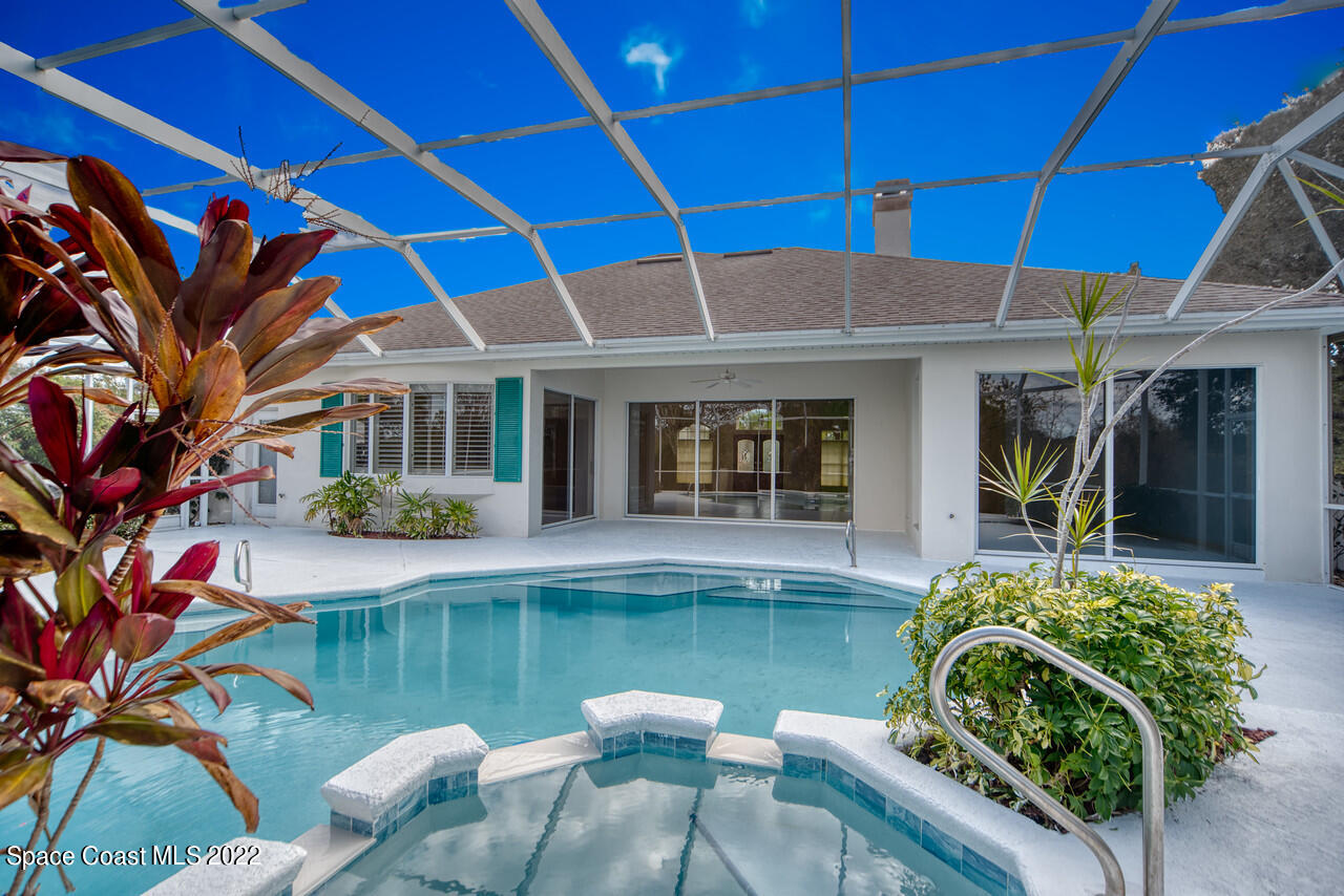 4099 Sparrow Hawk Road Melbourne, FL 32934 - Photo 9 of 48 a front view of a house with garden