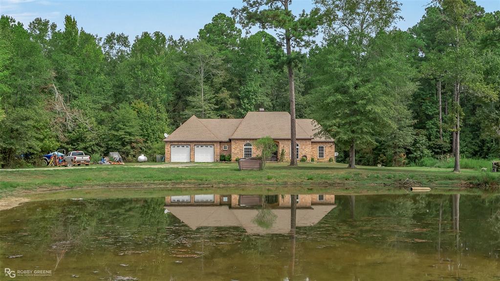 495 John Gloster, LA 71030 - Photo 12 of 40 a view of a house with a yard from a lake view