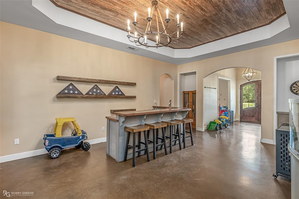 495 John Gloster, LA 71030 - Photo 18 of 40 a view of livingroom with furniture and chandelier fan