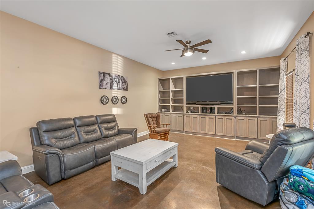 495 John Gloster, LA 71030 - Photo 25 of 40 a living room with furniture and a large window
