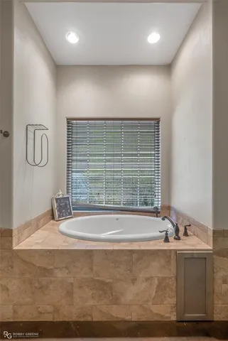 a room with a table and a mirror