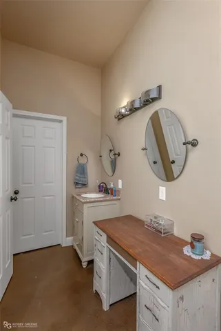 a utility room with sink dryer and washer