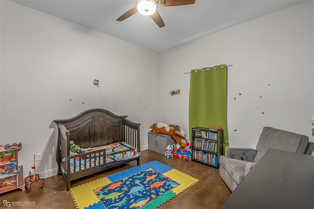 495 John Gloster, LA 71030 - Photo 37 of 40 a bedroom with furniture and a wooden floor