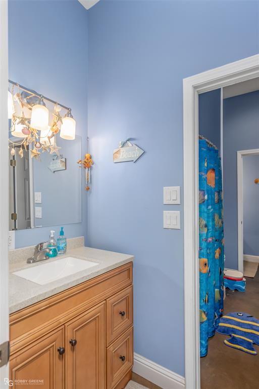 495 John Gloster, LA 71030 - Photo 40 of 40 a bathroom with a sink a vanity and a mirror