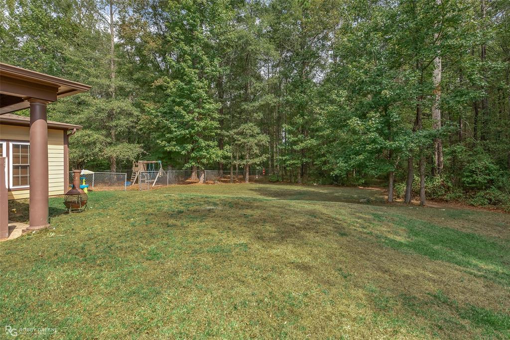 495 John Gloster, LA 71030 - Photo 5 of 40 a view of a trees in a yard