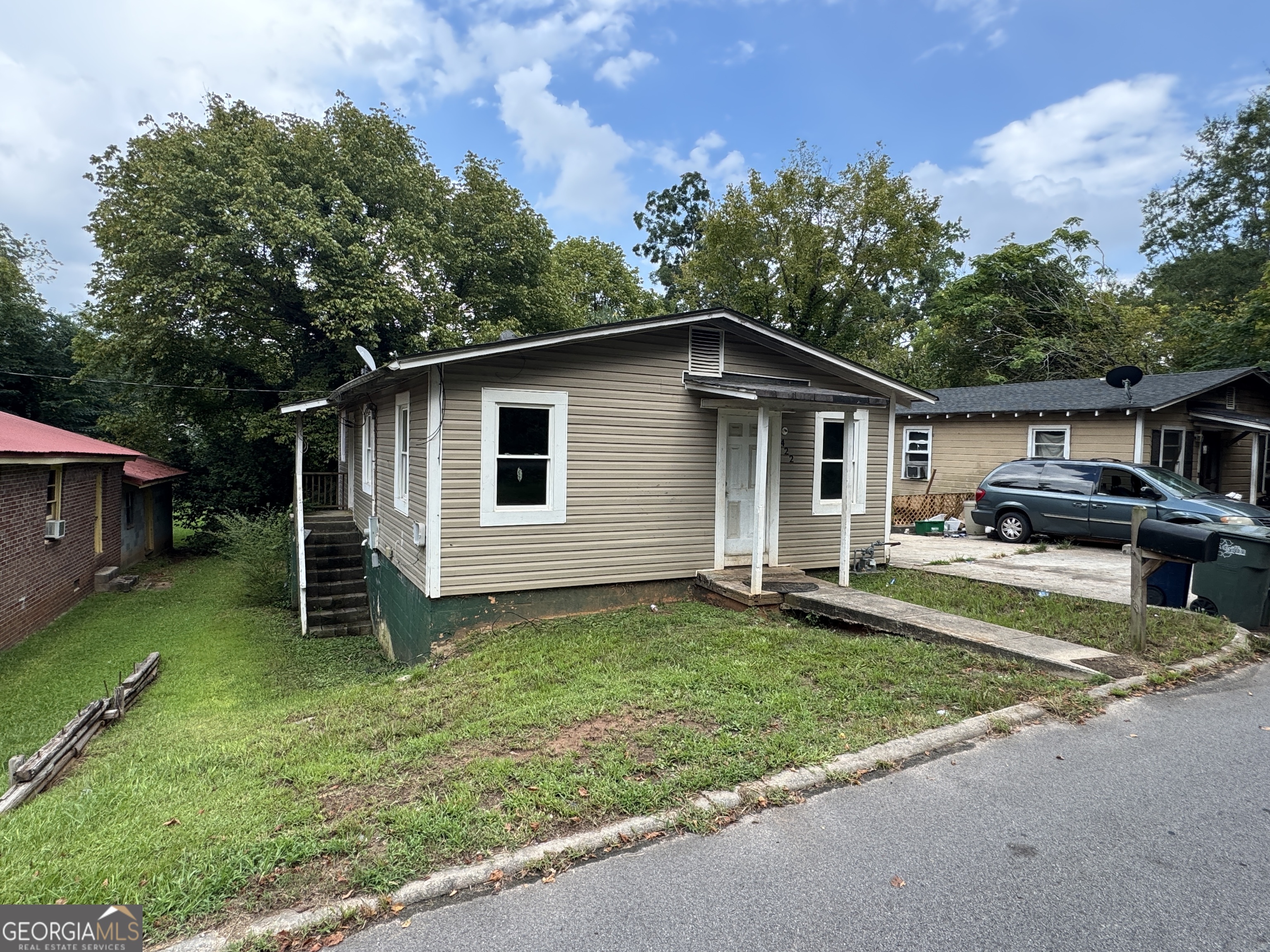 32 Unit Mutlipl Multiple Griffin, GA 30223 - Photo 7 of 24 a view of a yard with a house and a garden