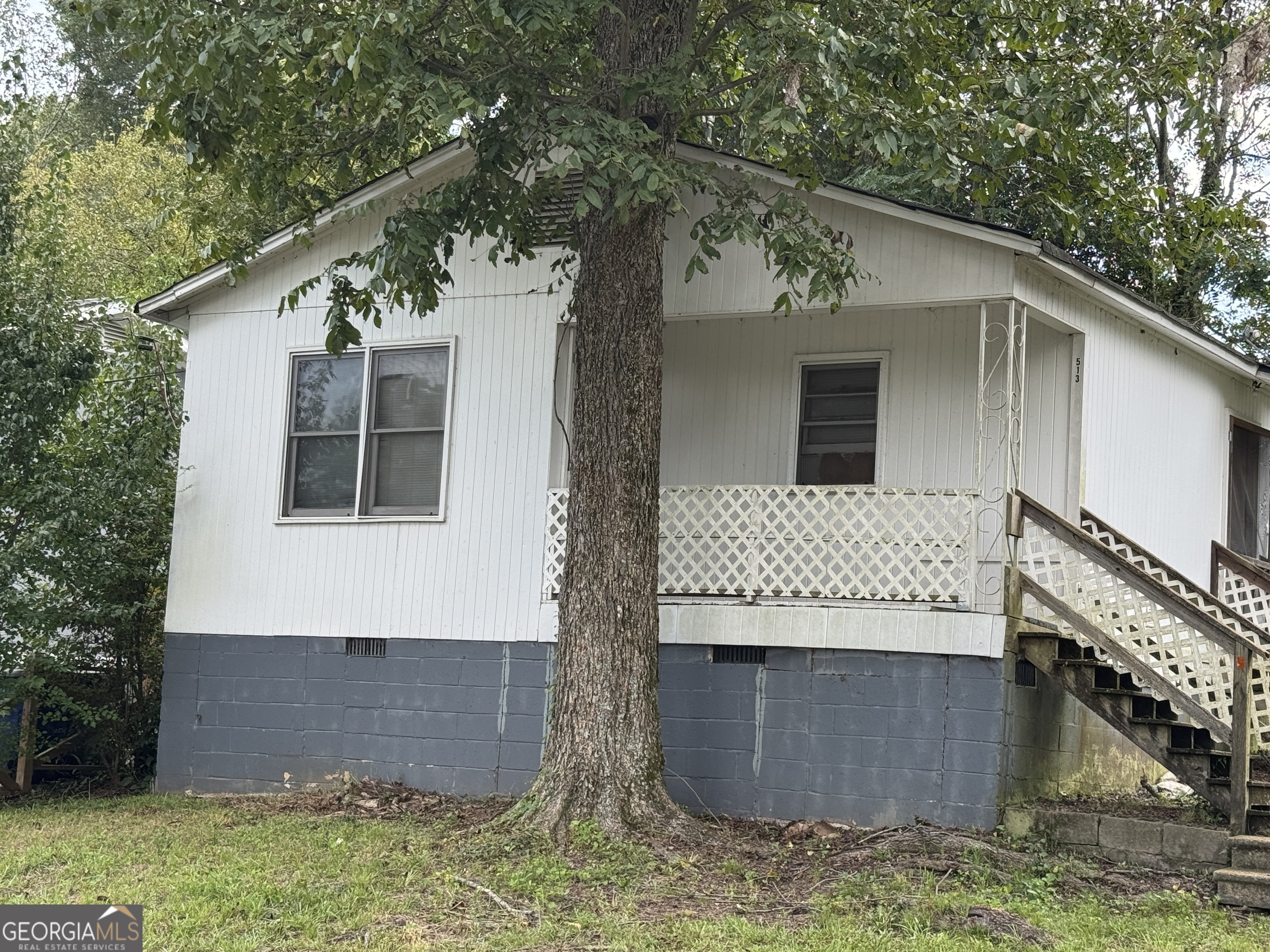 32 Unit Mutlipl Multiple Griffin, GA 30223 - Photo 10 of 24 a view of a house with a yard