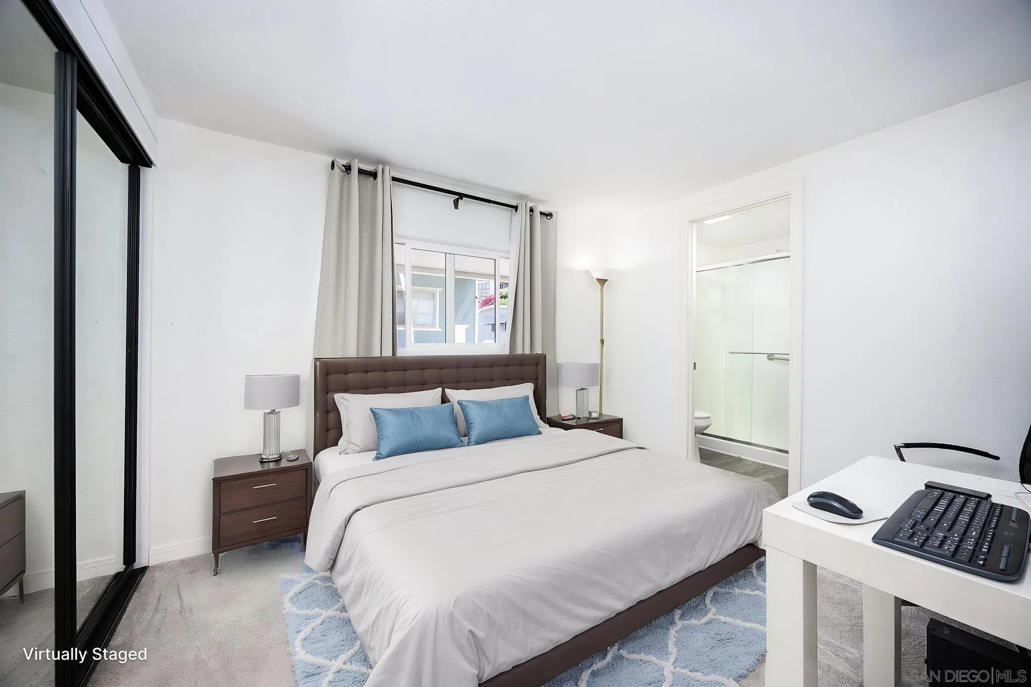 1815 Sweetwater Road, Unit SPC 121 Spring Valley, CA 91977 - Photo 15 of 44 a bedroom with a bed and a window