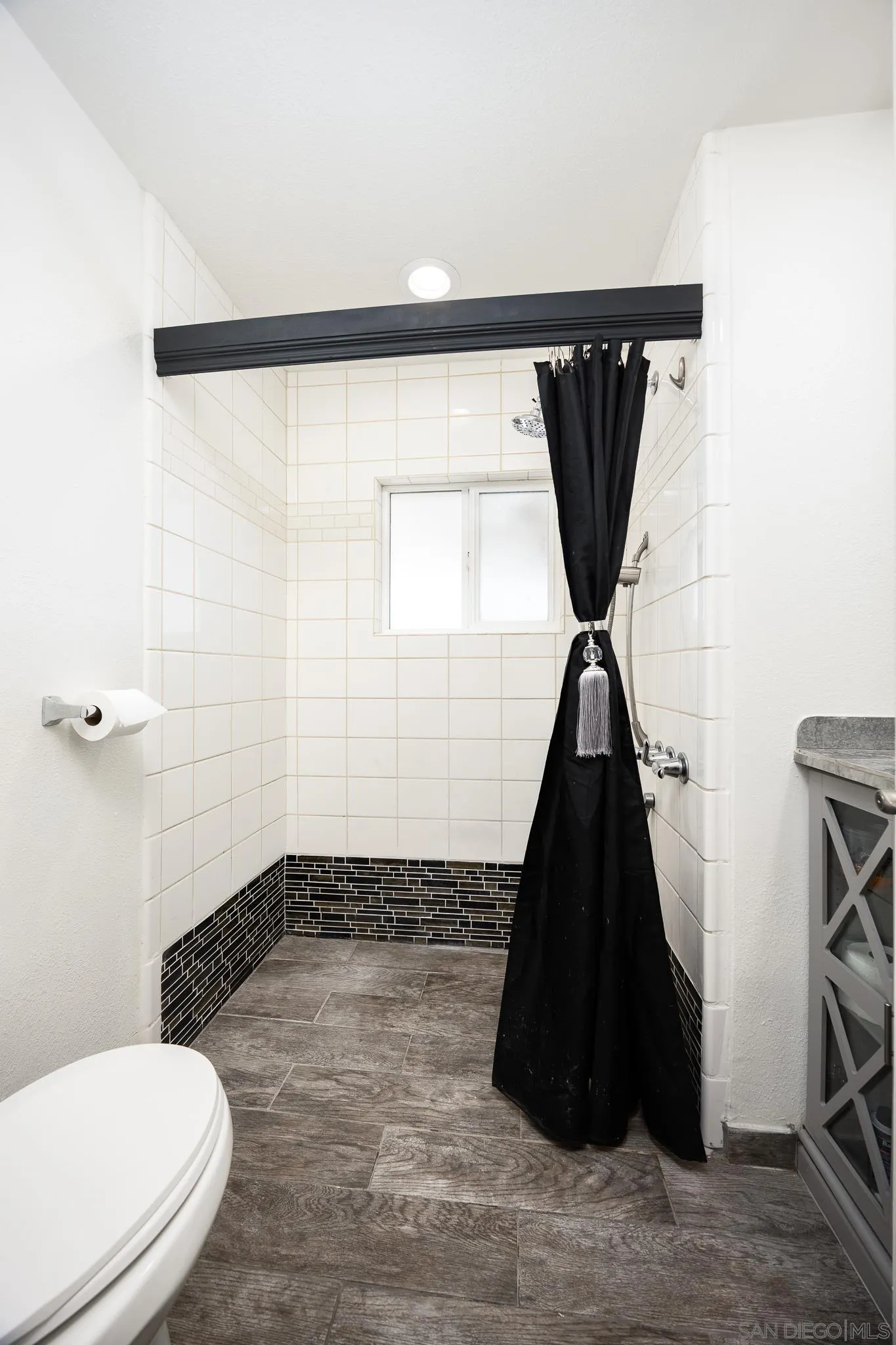 1815 Sweetwater Road, Unit SPC 121 Spring Valley, CA 91977 - Photo 20 of 44 a bathroom with a toilet and a shower