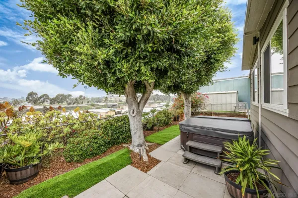 a backyard of a house with seating space