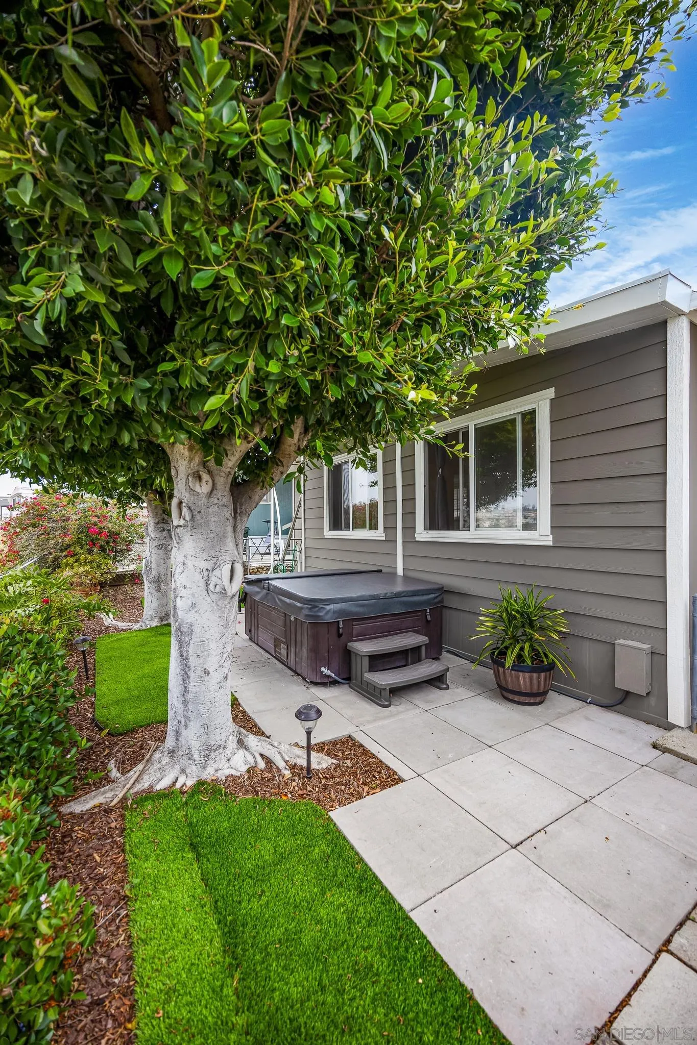 1815 Sweetwater Road, Unit SPC 121 Spring Valley, CA 91977 - Photo 23 of 44 a backyard of a house with seating space