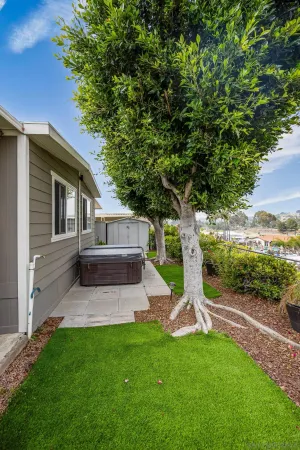 a view of a yard with patio