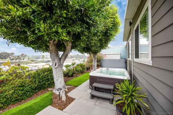 a view of a swimming pool with a patio