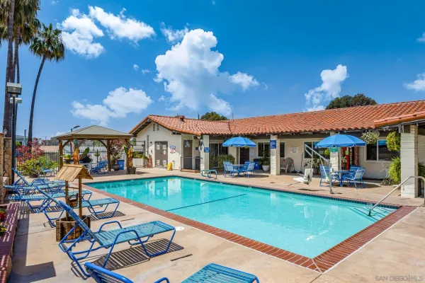 a view of a chairs and tables in patio