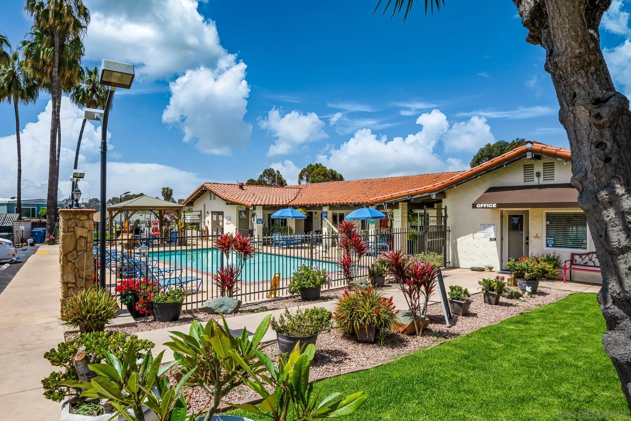 1815 Sweetwater Road, Unit SPC 121 Spring Valley, CA 91977 - Photo 29 of 44 a view of a chairs and tables in patio