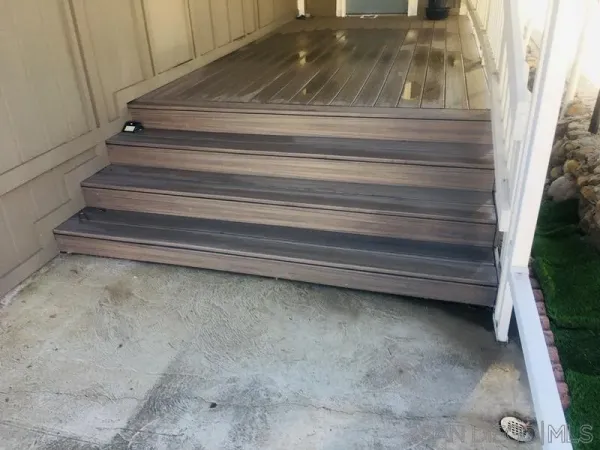 a view of house with yard and outdoor space