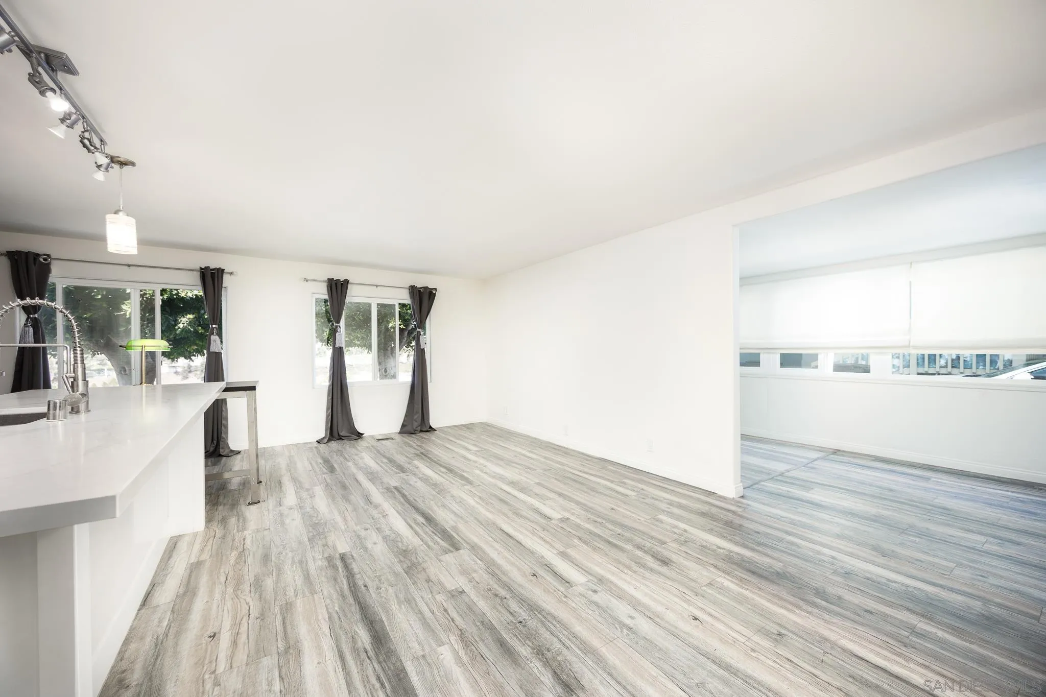 1815 Sweetwater Road, Unit SPC 121 Spring Valley, CA 91977 - Photo 9 of 44 a view of empty room with wooden floor