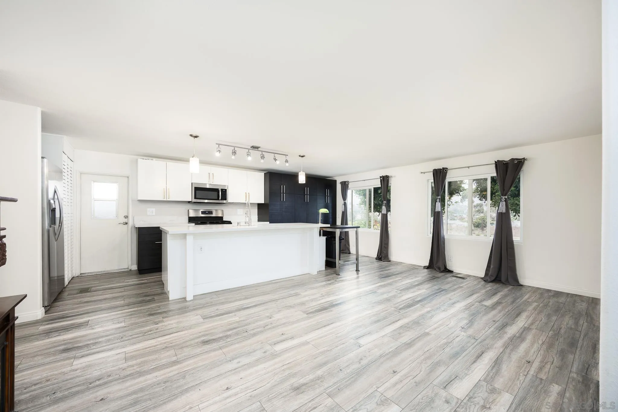 1815 Sweetwater Road, Unit SPC 121 Spring Valley, CA 91977 - Photo 10 of 44 a view of a kitchen with wooden floor