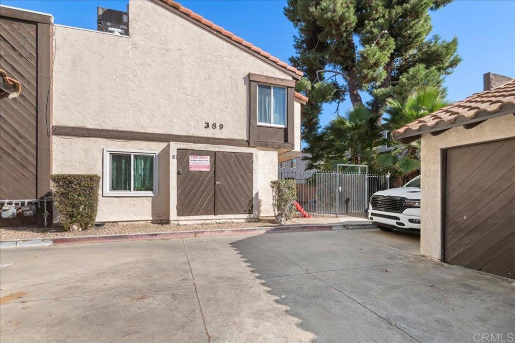 389 Shady Lane, Unit D El Cajon, CA 92021 - Photo 2 of 30 a view of a car park in front of house