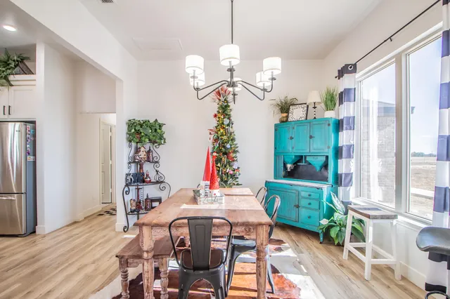 a view of living room with furniture and a flat screen tv