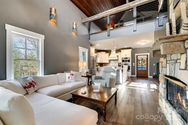 a bathroom with a double vanity sink a mirror and a toilet