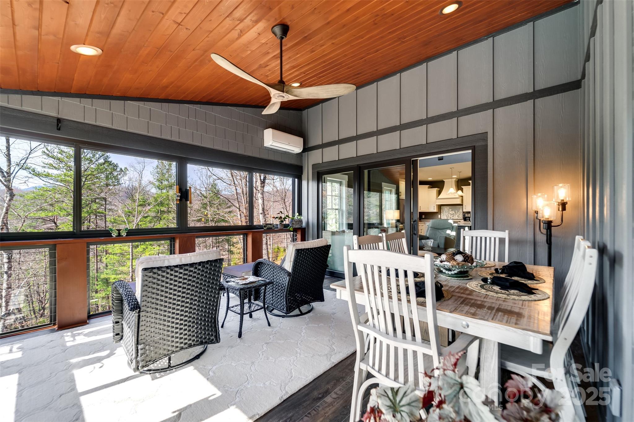 117 Amberleaf Way Cullowhee, NC 28723 - Photo 18 of 47 a dining room with furniture a chandelier and fireplace