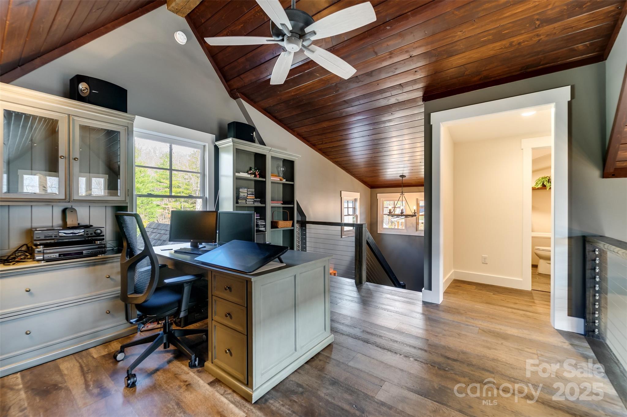 117 Amberleaf Way Cullowhee, NC 28723 - Photo 25 of 47 a view of a kitchen with fridge and wooden floor