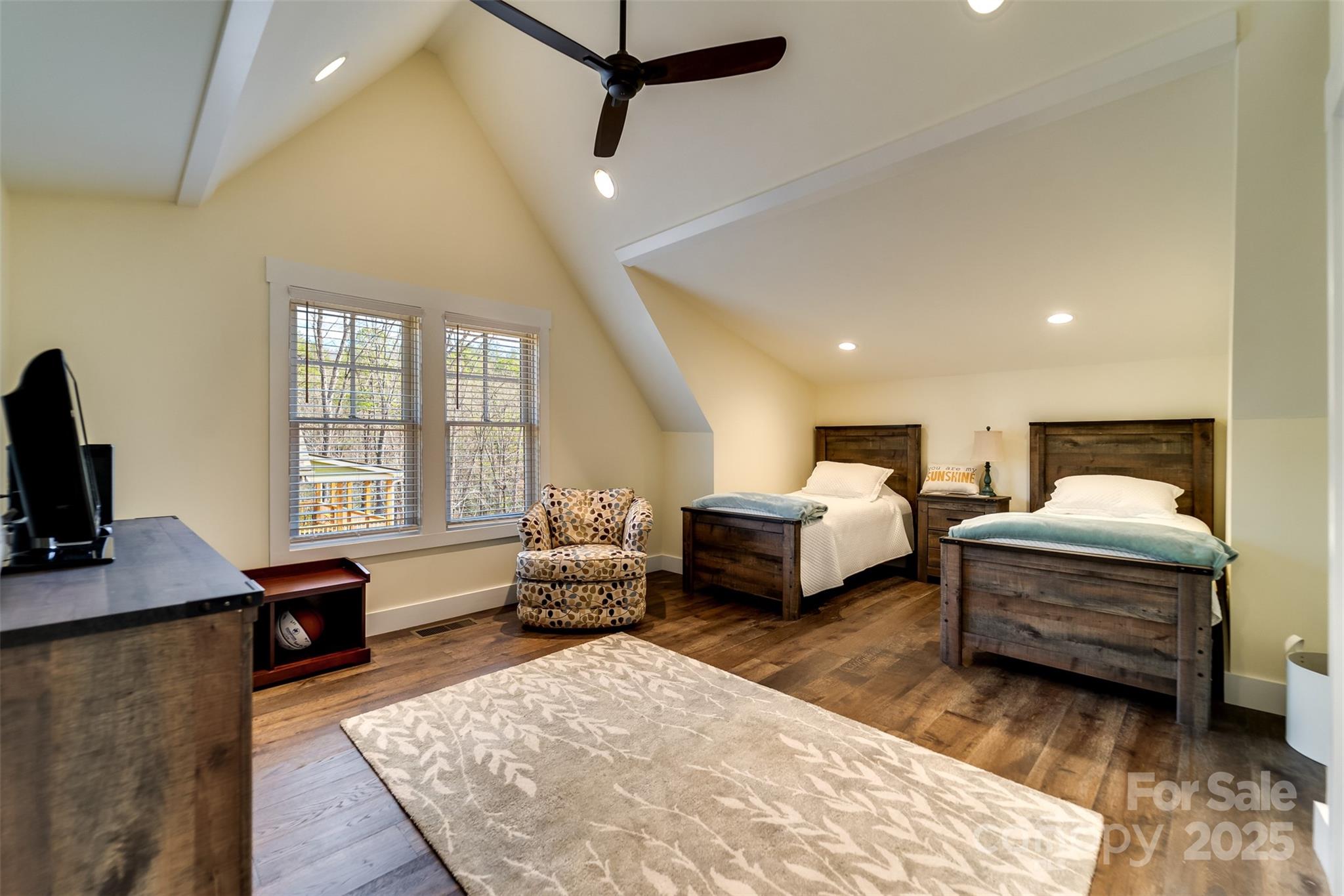 117 Amberleaf Way Cullowhee, NC 28723 - Photo 27 of 47 a bedroom with a bed and wooden floor