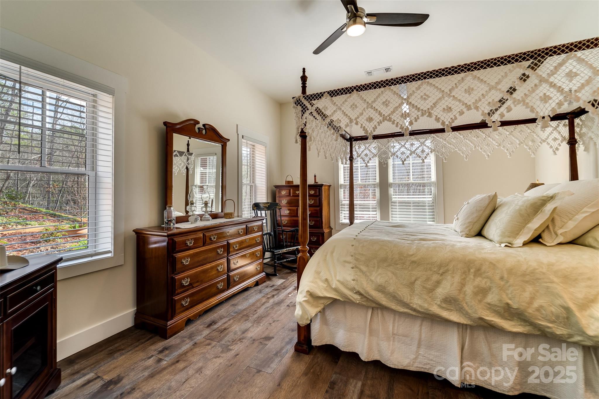 117 Amberleaf Way Cullowhee, NC 28723 - Photo 30 of 47 a bedroom with a bed and large windows