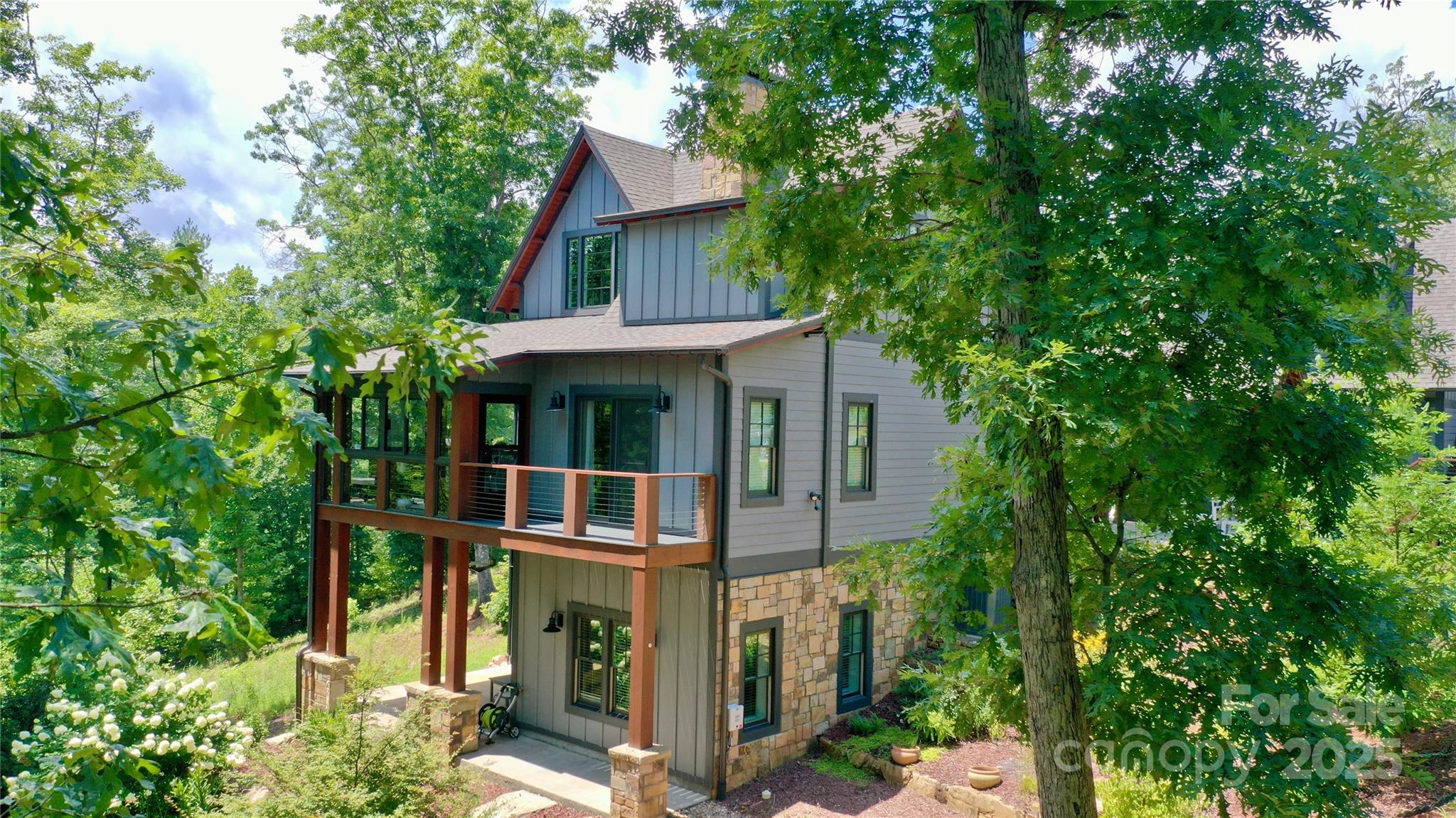 117 Amberleaf Way Cullowhee, NC 28723 - Photo 3 of 47 front view of a house with a tree