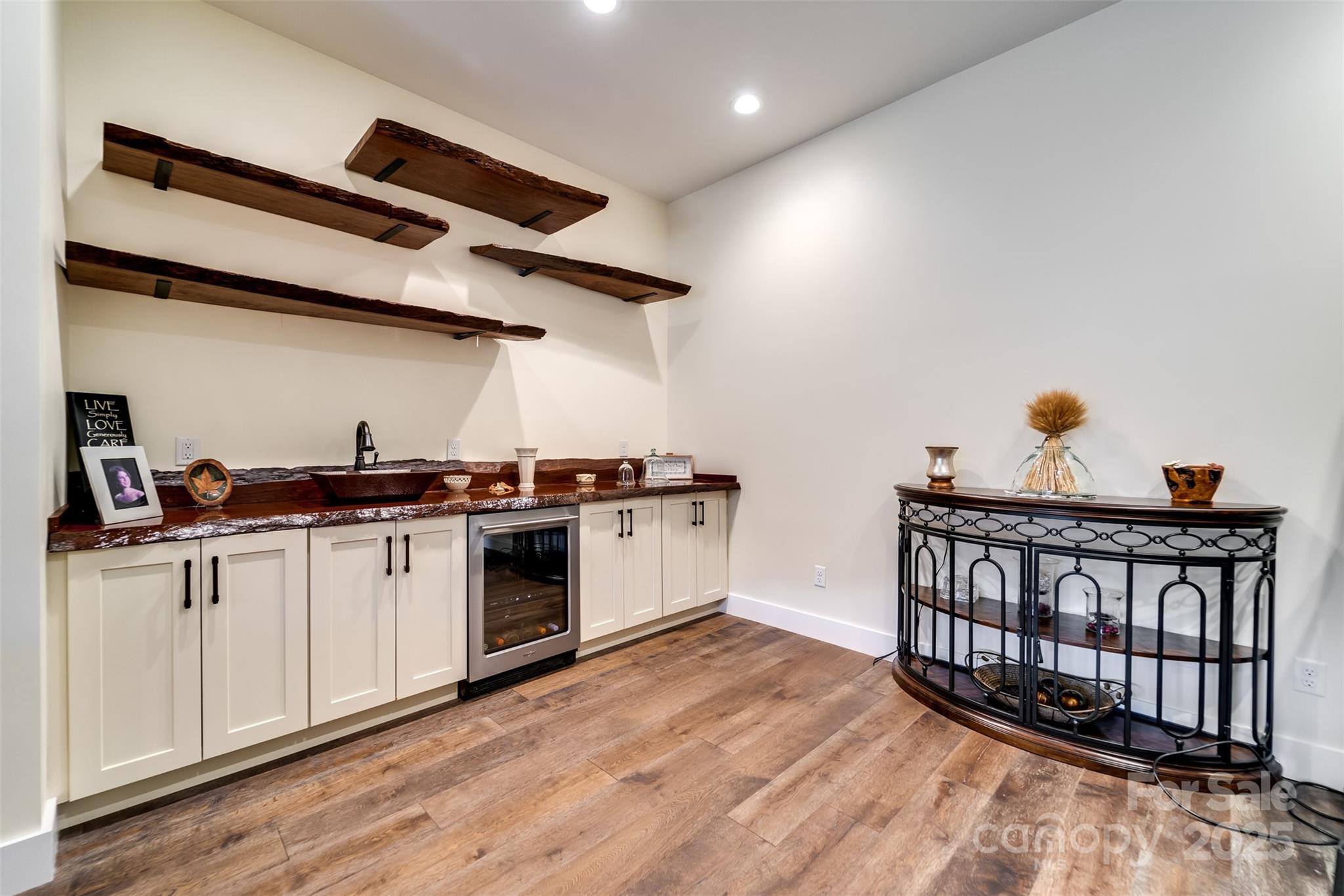 117 Amberleaf Way Cullowhee, NC 28723 - Photo 35 of 47 a kitchen with stainless steel appliances granite countertop a stove and a wooden floors
