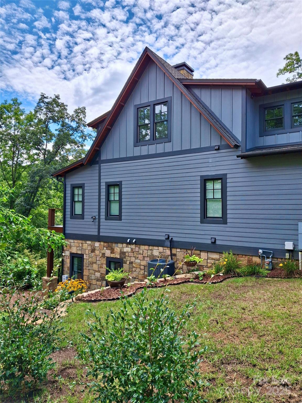 117 Amberleaf Way Cullowhee, NC 28723 - Photo 4 of 47 a front view of a house with a yard