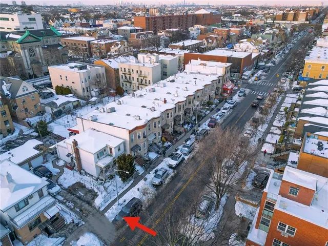 an aerial view of a city with lots of residential buildings