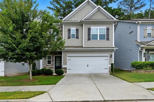 a view of house and outdoor space with yard