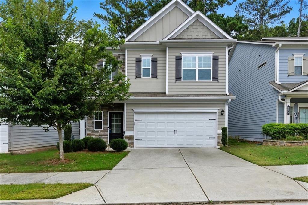 140 Bryon Lane Acworth, GA 30102 - Photo 1 of 39 a view of house and outdoor space with yard