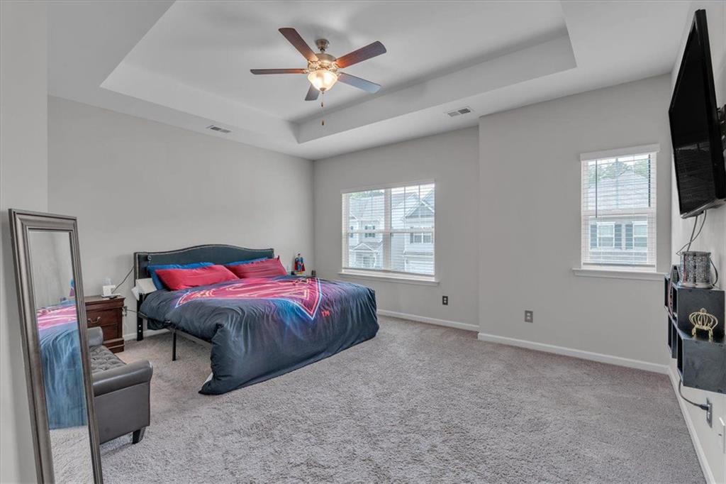 140 Bryon Lane Acworth, GA 30102 - Photo 15 of 39 a living room with furniture a flat screen tv and a window