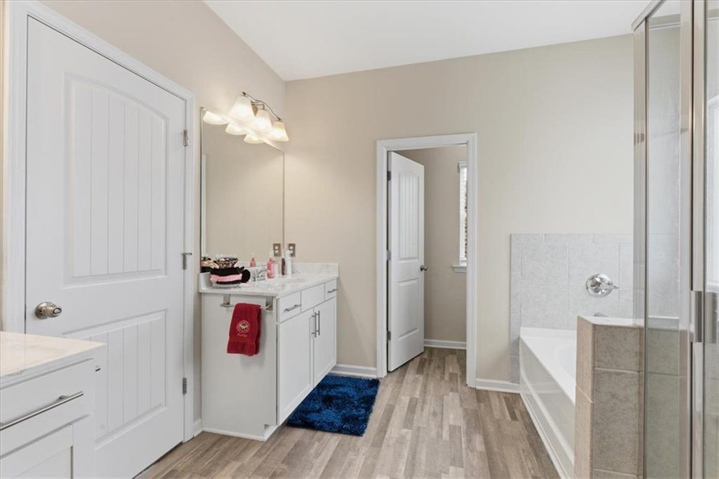 140 Bryon Lane Acworth, GA 30102 - Photo 19 of 39 a storage room with wooden floor