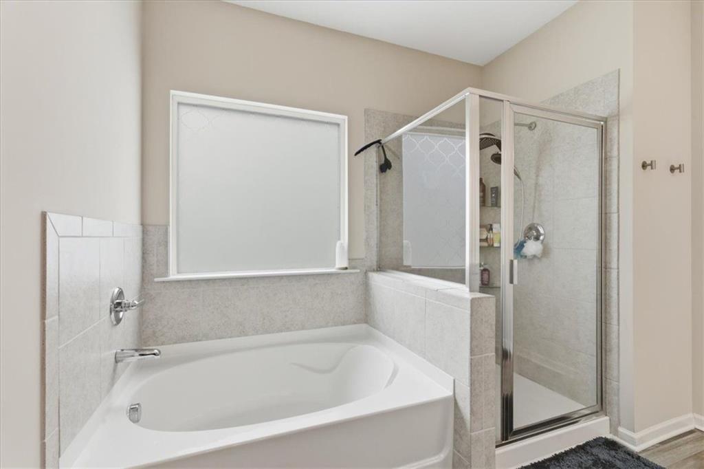140 Bryon Lane Acworth, GA 30102 - Photo 22 of 39 a white bath tub sitting next to a shower