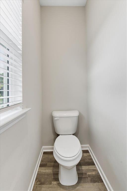 140 Bryon Lane Acworth, GA 30102 - Photo 28 of 39 a white toilet sitting next to a window