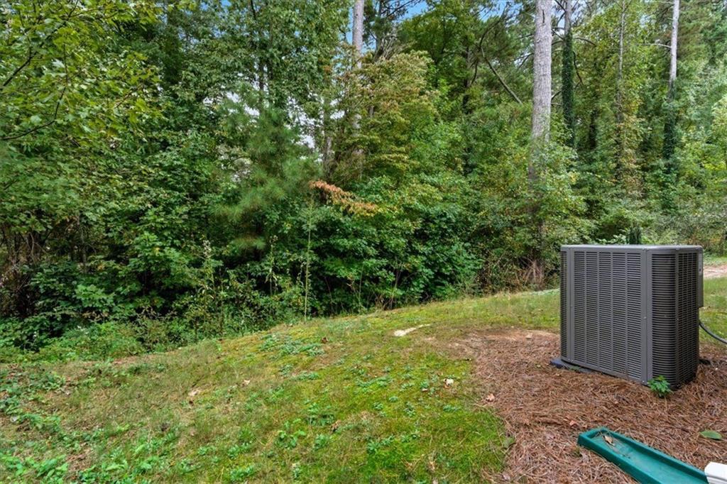 140 Bryon Lane Acworth, GA 30102 - Photo 33 of 39 a view of backyard with small cabin
