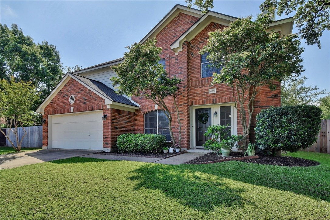 16709 Shipshaw River Drive Leander, TX 78641 - Photo 1 of 1 front view of house with a yard
