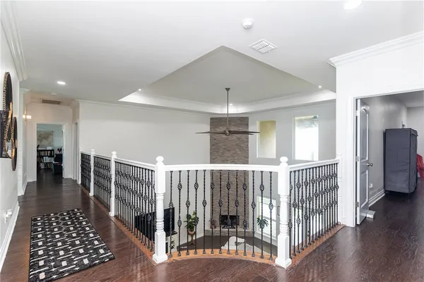 a view of entryway with wooden floor