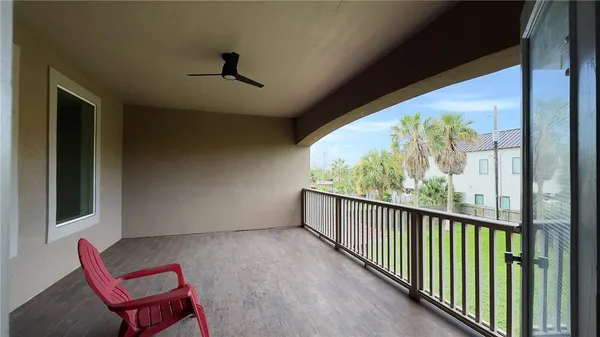 a view of a chair in a balcony