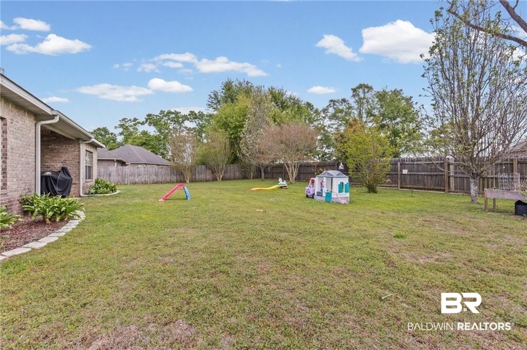 2570 Pecan Pointe Drive Semmes, AL 36575 - Photo 18 of 22 View of fenced backyard