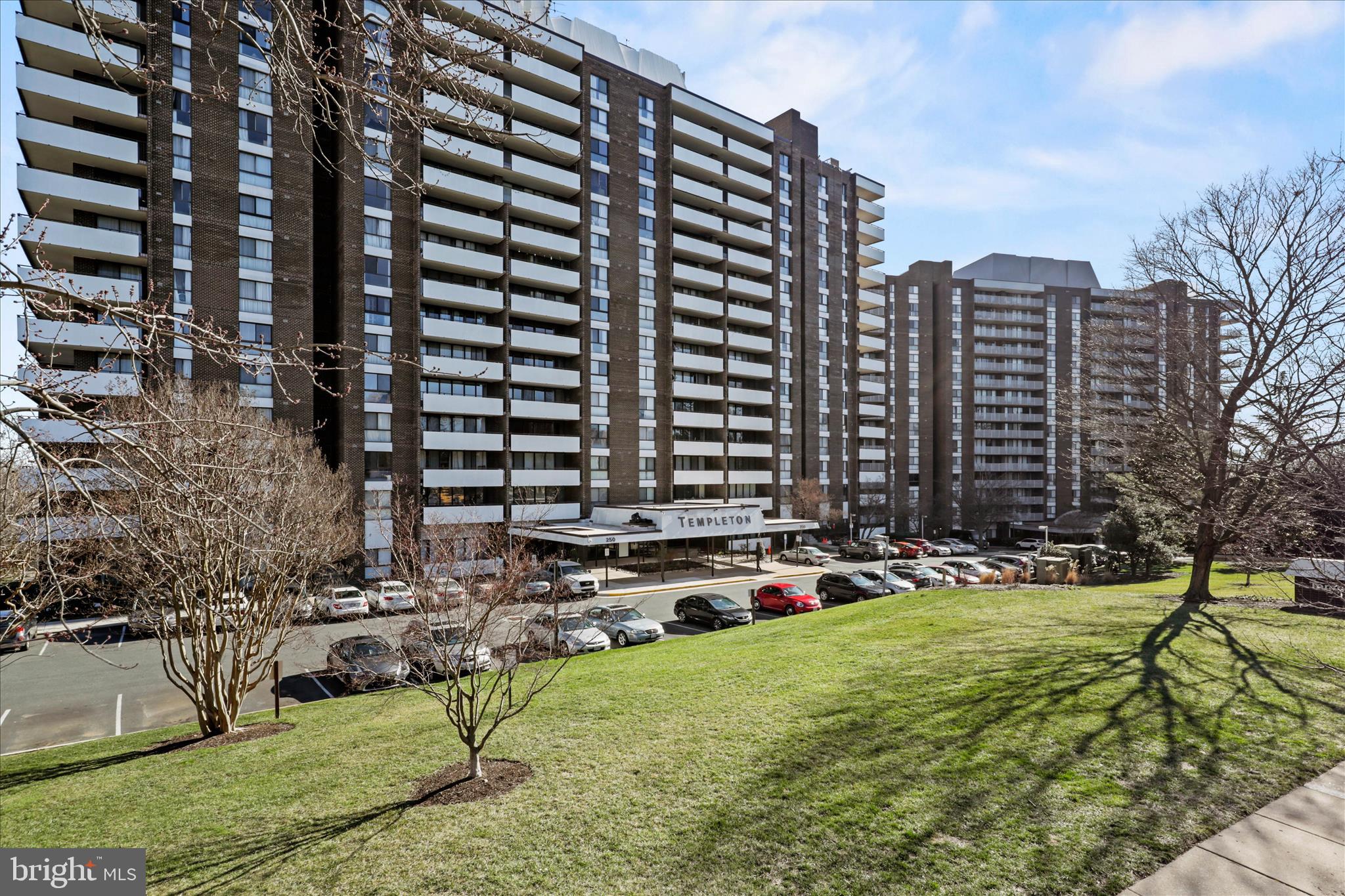 250 South Reynolds Street, Unit 105 Alexandria, VA 22304 - Photo 1 of 39 a view of swimming pool with outdoor seating and plants