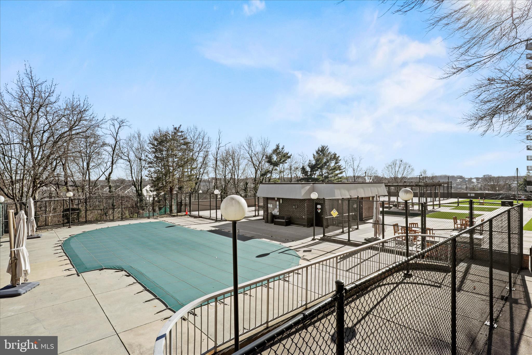 250 South Reynolds Street, Unit 105 Alexandria, VA 22304 - Photo 34 of 39 a view of a swimming pool with a lounge chair