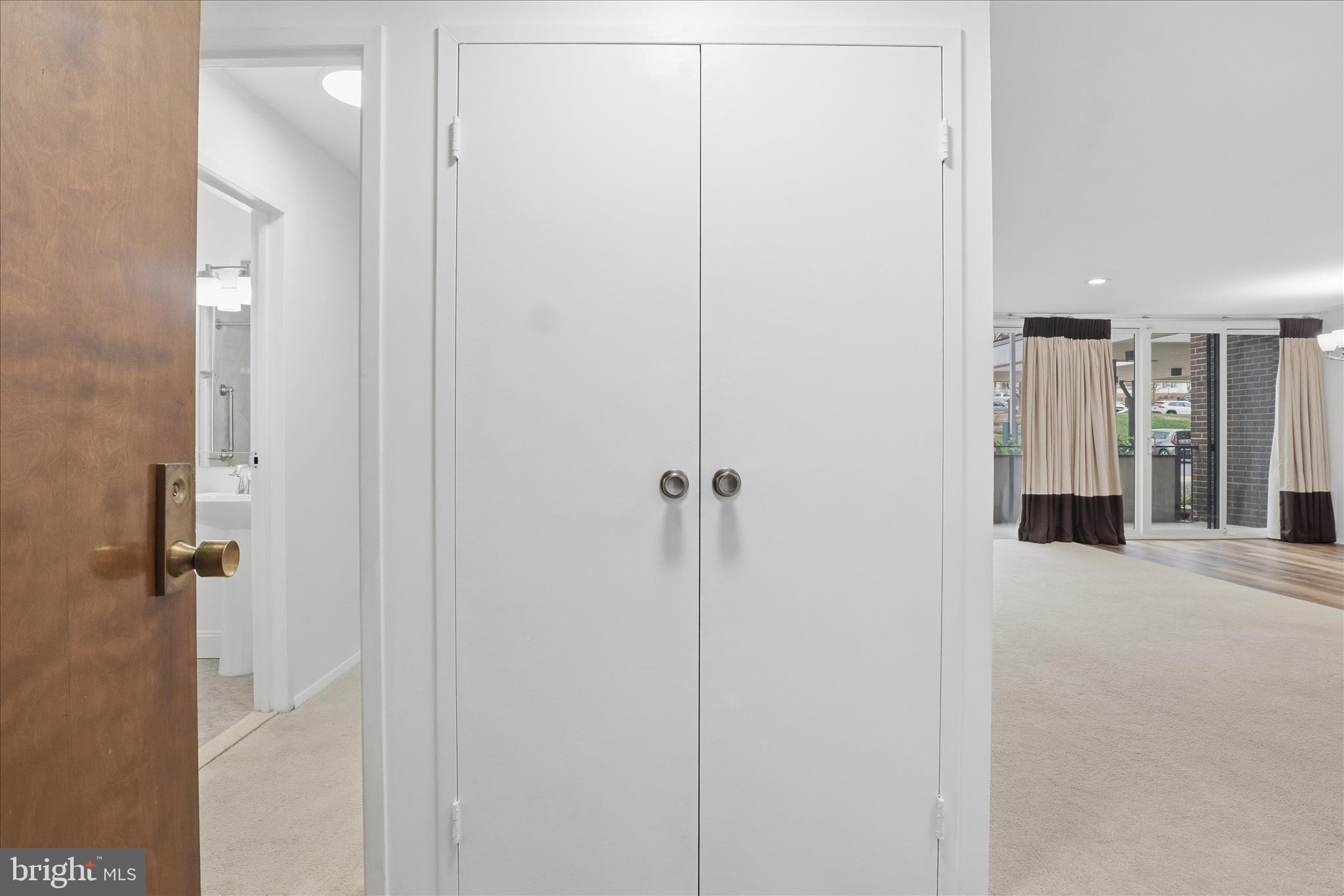 250 South Reynolds Street, Unit 105 Alexandria, VA 22304 - Photo 4 of 39 a view of a bathroom with a shower